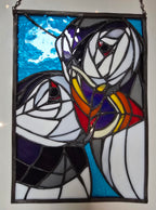Stained glass puffin panel