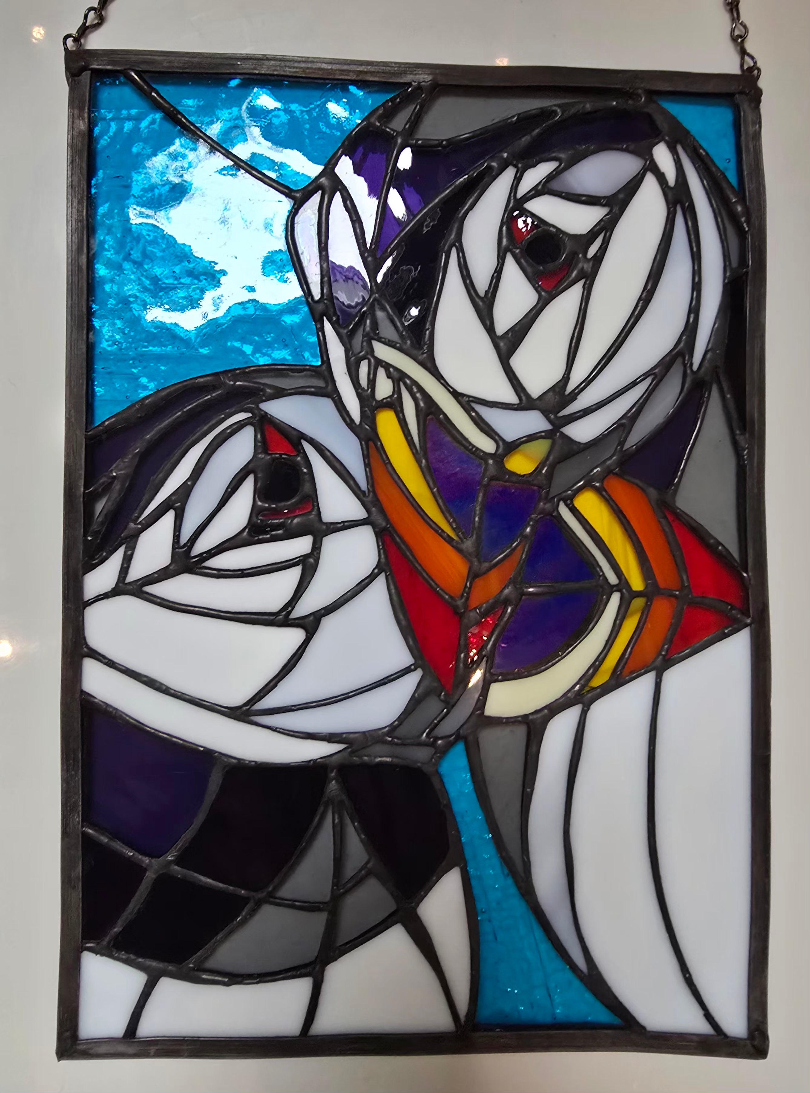 Stained glass puffin panel